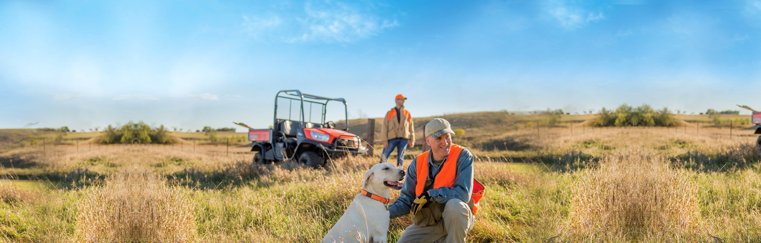 Lifestyle picture of man with a dog